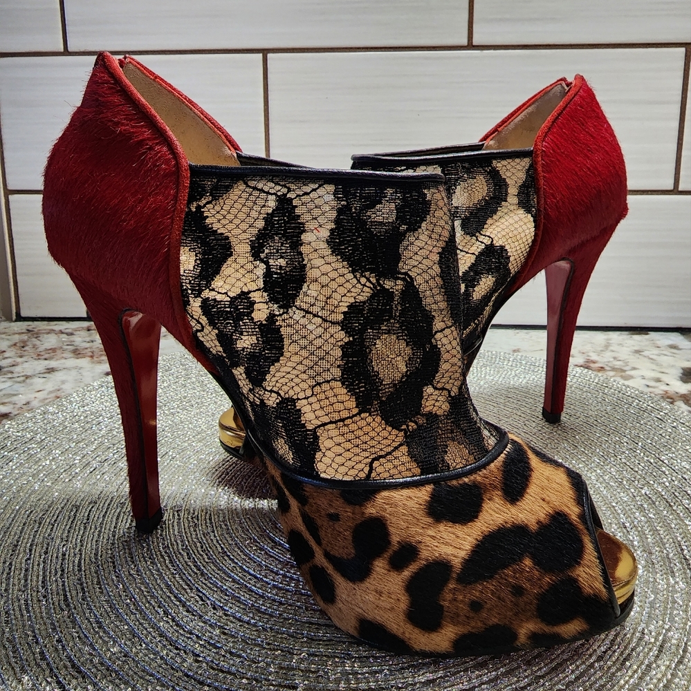 Christian Louboutin cheetah lace bootie